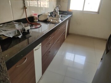 Kitchen in 1 BHK Apartment at Puranik Aarambh, Ghodbunder Road – for Rent