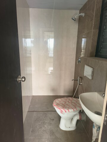 Bathroom in 1 BHK Apartment at Shapoorji Pallonji Joyville, Virar West – for Sale