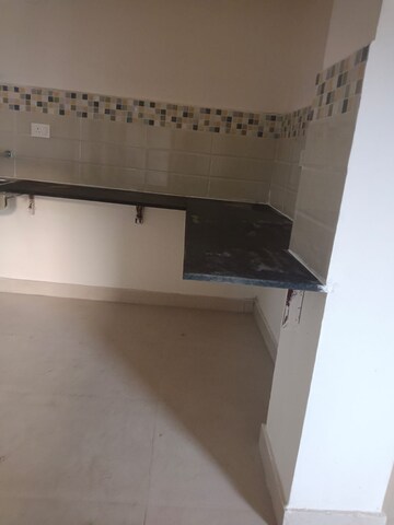 Kitchen in 2 BHK Apartment at Signature Global Orchard Avenue, Sector 93 – for Sale