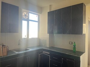 Kitchen in 2 BHK Apartment at ROF Aalayas, Sector 102 – for Sale