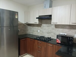 Kitchen in 3 BHK Apartment at Wave Amore, Sector 32 – for Sale