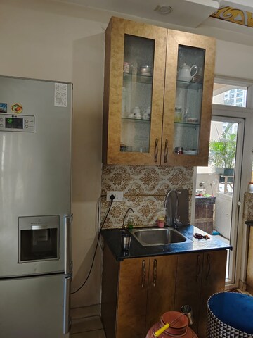 Kitchen in 3 BHK Apartment at Gaur Sportswood, Sector 79 – for Rent