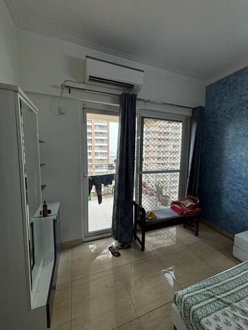 Living Room in 3 BHK Apartment at Gaur Sportswood, Sector 79 – for Rent