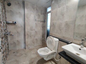 Bathroom in 3 BHK Apartment at Mahagun Mirabella, Sector 79 – for Rent