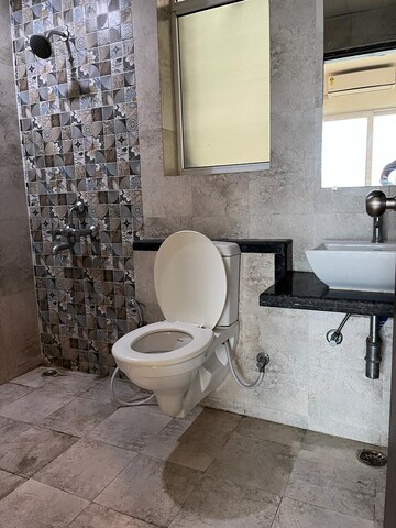 Bathroom in 2 BHK Apartment at Mahagun Mirabella, Sector 79 – for Rent