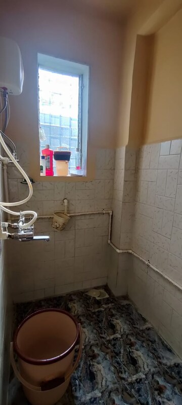 Bathroom in 1 BHK Apartment at Kondivita CHS, Andheri East – for Rent