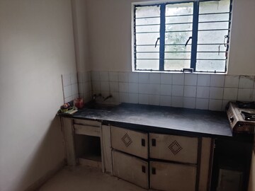 Kitchen in 1 BHK Apartment at Mokate Tower, Bhusari Colony – for Rent