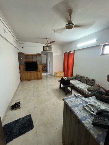 Living Room in 1 BHK Apartment at Lodha Palava Downtown, Dombivli East – for Rent