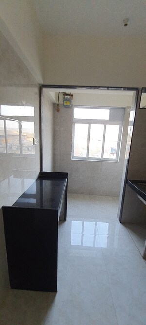 Living Room in 1 BHK Apartment at Ranuja Ramdev, Bhayandar East – for Sale