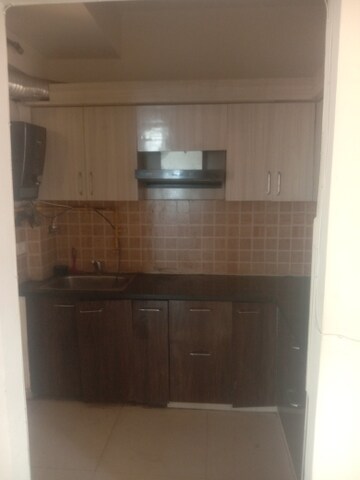 Kitchen in 2.5 BHK Apartment at Mahagun Mywoods, Sector 16c Greater Noida – for Rent