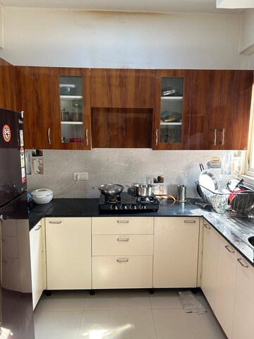 Kitchen in 2.5 BHK Apartment at Aims Golf Avenue I, Sector 75 – for Rent
