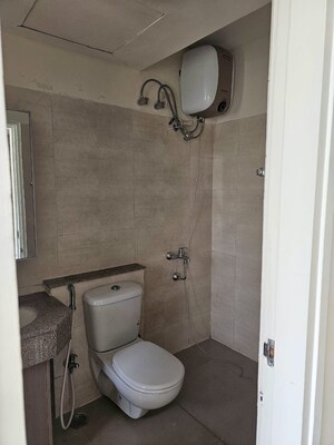 Bathroom in 3 BHK Apartment at Raheja Vedaanta, Sector 108 – for Sale
