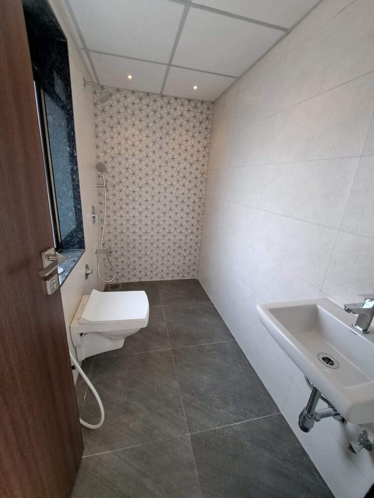 Bathroom, lalani-valentine-apartment-1-wing-d 1 Bedroom 645 Sq.Ft. Apartment In Malad East Mumbai 8609388