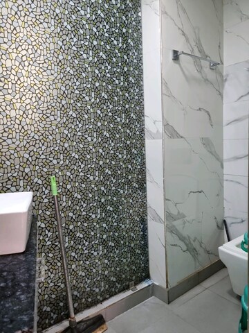 Bathroom in 1.5 BHK Builder Floor at Tilak Nagar – for Rent