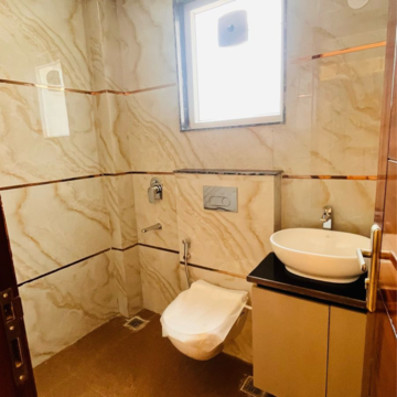 Bathroom in 4 BHK Builder Floor at Ansal API Esencia, Sector 67 – for Sale