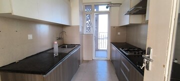 Kitchen in 3 BHK Apartment at Conscient Heritage Max, Sector 102 – for Rent