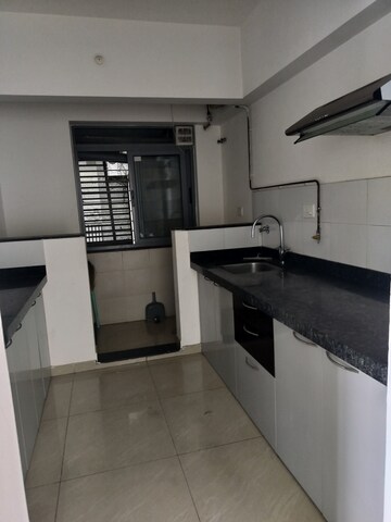 Kitchen in 2 BHK Apartment at Amanora Future Towers, Hadapsar – for Rent