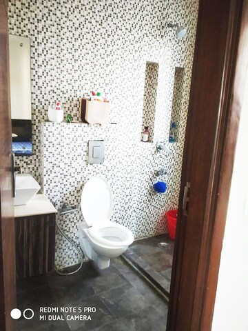 Bathroom in 3 BHK Builder Floor at Ansal Sushant Lok I, Sector 43 – for Rent