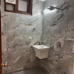 Bathroom in 3 BHK Builder Floor at Khirki Extension – for Sale