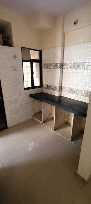 Kitchen in 1 BHK Apartment at Manibhadra Avenue, Nalasopara West – for Sale