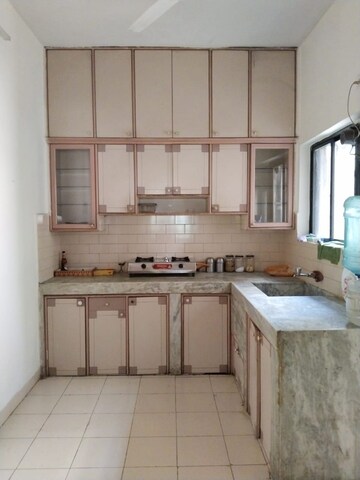 Kitchen in 2 BHK Apartment at Meera Nagar Garden CHS, Koregaon Park – for Rent