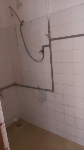 Bathroom in 1 RK Apartment at Gujrat Colony – for Rent