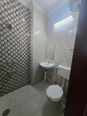 Bathroom in 2 BHK Builder Floor at Khirki Extension – for Rent