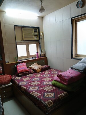 Bedroom in 2 BHK Apartment at Vasant Sarita, Kandivali East – for Sale