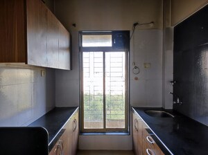 Kitchen in 2 BHK Apartment at Innovative R K Residency, Nerul – for Sale