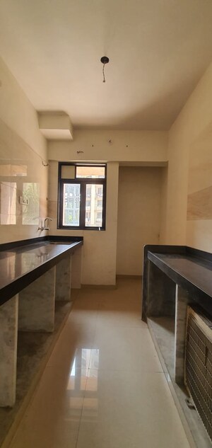 Kitchen in 3 BHK Apartment at Parsik Nagar – for Sale