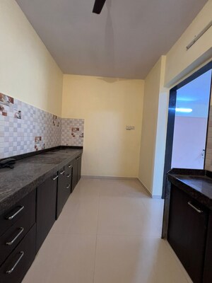 Kitchen in 3 BHK Apartment at Parsik Nagar – for Sale