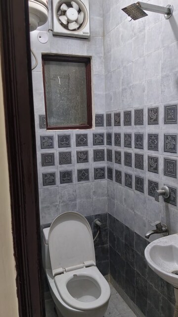 Bathroom in 2.5 BHK Builder Floor at Savitri Nagar – for Rent