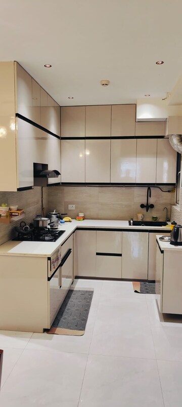 Kitchen in 4 BHK Apartment at Gaur City 2 - 16th Avenue, Sector 16c Greater Noida – for Sale