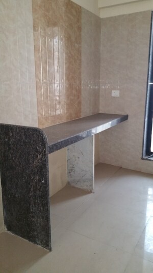 Kitchen in 3 BHK Apartment at Sandstone CHS Ltd, Mira Road – for Sale