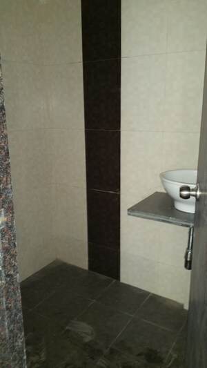 Bathroom in 3 BHK Apartment at Sandstone CHS Ltd, Mira Road – for Sale