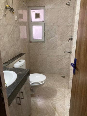 Bathroom in 3 BHK Apartment at Adani Oyster Grande Phase 2, Sector 102 – for Rent
