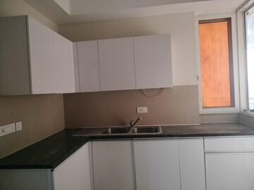 Kitchen in 3 BHK Apartment at Adani Oyster Arcade, Sector 102 – for Rent
