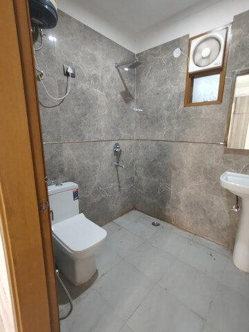 Bathroom in 3 BHK Apartment at Chattarpur – for Rent