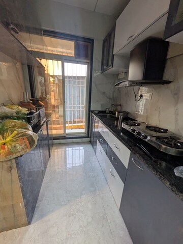 Kitchen in 2 BHK Apartment at Shree Om Shree Ganesh Chhaya CHS, Kalyan West – for Rent
