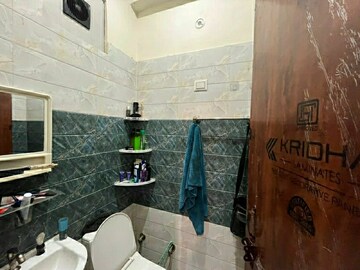 Bathroom in 2 BHK Apartment at Nitishree Aura Chimera, Raj Nagar Extension – for Rent