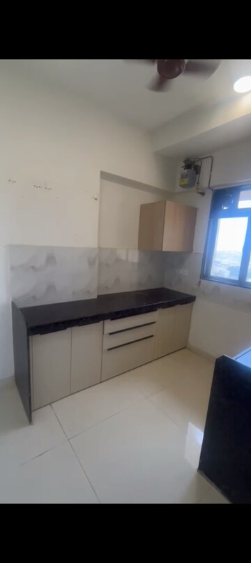 Kitchen in 2 BHK Apartment at Lotus Unity, Versova – for Rent