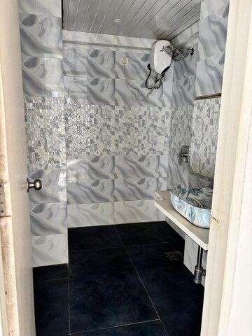 Bathroom in 2 BHK Apartment at Mohini Castle, Khar West – for Rent