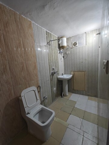 Bathroom in 2.5 BHK Builder Floor at Smart World Gems, Sector 89 – for Rent