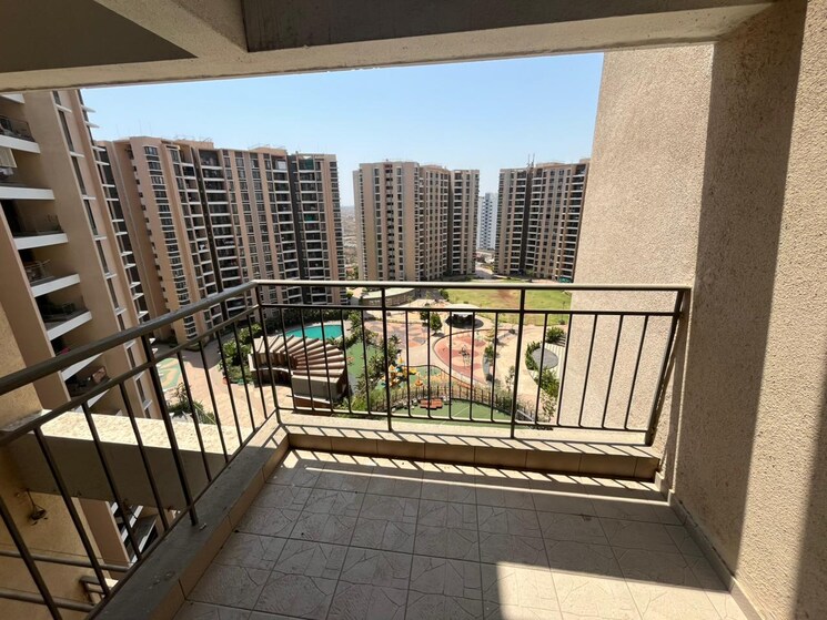 Balcony, pride-world-city-kingsbury 3 Bedroom 1050 Sq.Ft. Apartment In Charholi Budruk Pune 8613820