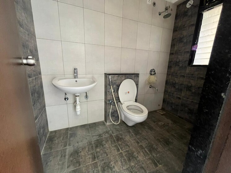 Bathroom, pride-world-city-kingsbury 3 Bedroom 1050 Sq.Ft. Apartment In Charholi Budruk Pune 8613820