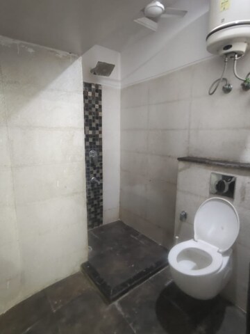 Bathroom in 3 BHK Builder Floor at Ansal Sushant Lok I, Sector 43 – for Rent