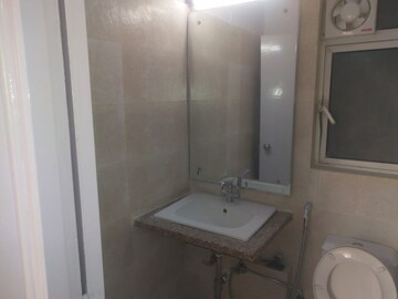 Bathroom in 3 BHK Apartment at Moti Nagar – for Rent