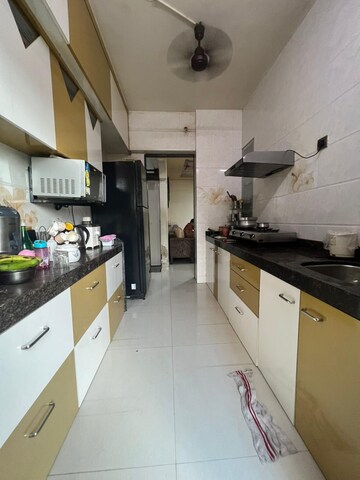 Kitchen in 2 BHK Apartment at Parsik Nagar – for Sale