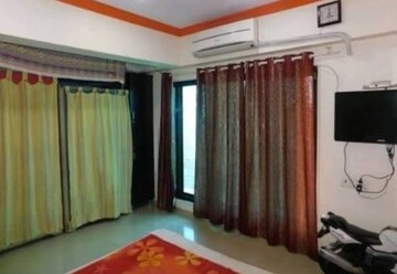 Bedroom in 2 BHK Apartment at Jawaharban CHS, Andheri West – for Sale