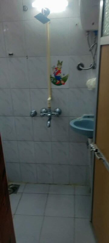 Bathroom in 1 BHK Apartment at Lok Puram, Vasant Vihar – for Rent